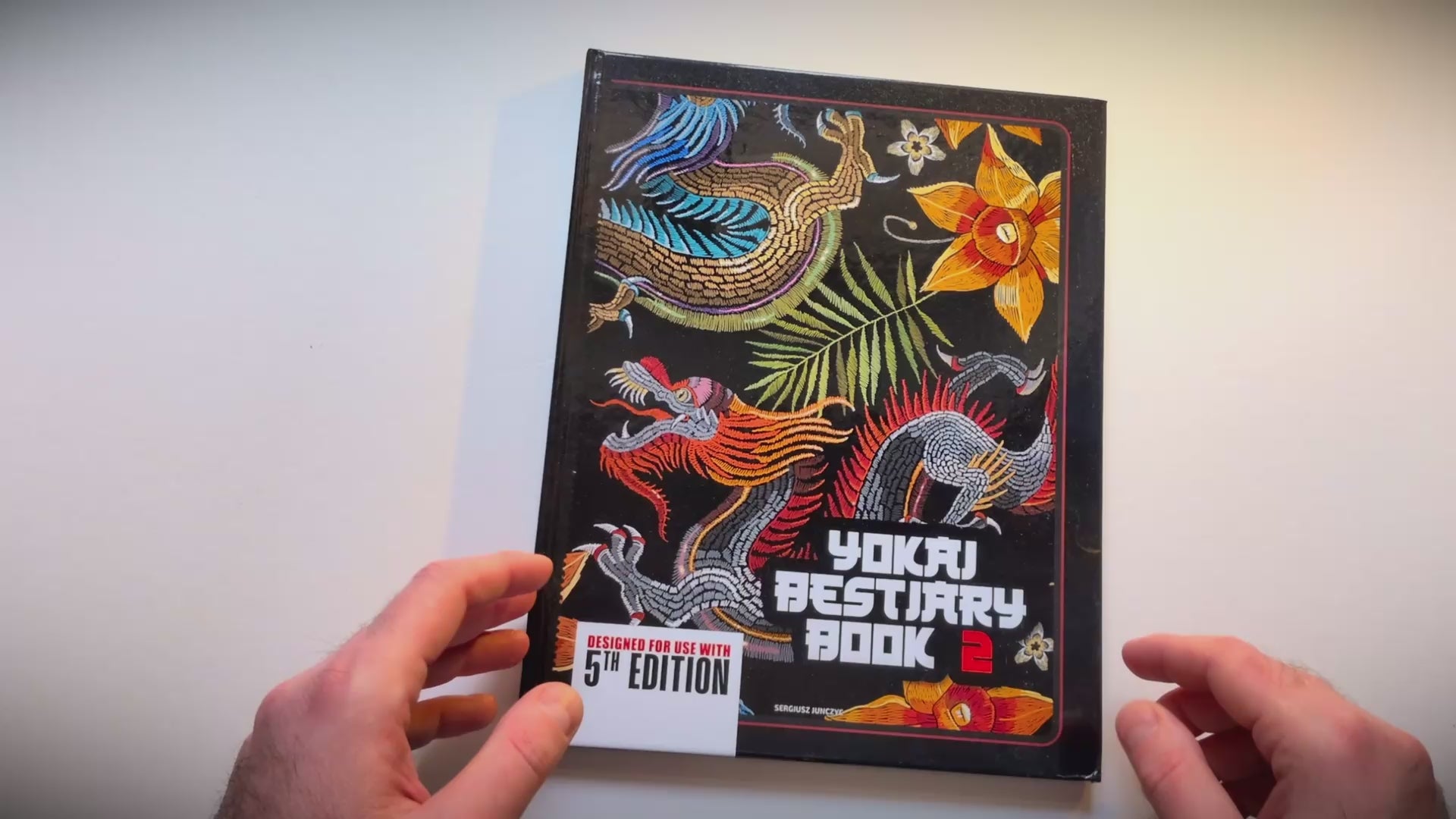 In this second volume of the Yokai Bestiary, viewers discover 40-plus creatures from Japanese folklore—complete 5E stat blocks, authentic legends, adventure hooks, tactical GM tips, and full-color art—ready to enrich any tabletop RPG campaign with ritual-driven horror and mythic depth. fernflowerpress.com
